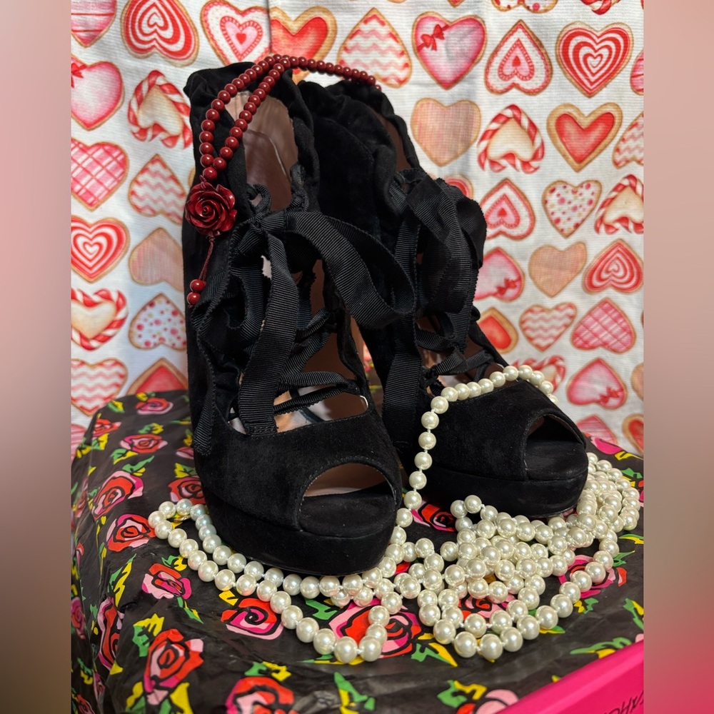 2 1/2 inch black suede heels.
